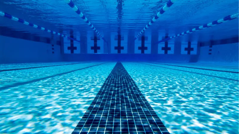 Lane markings on the floor of a lap pool